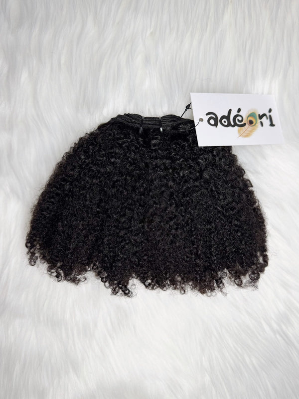 Ìyẹ́ - Afro Curly, 4B–4C weft, fanned to show the tight afro-curl