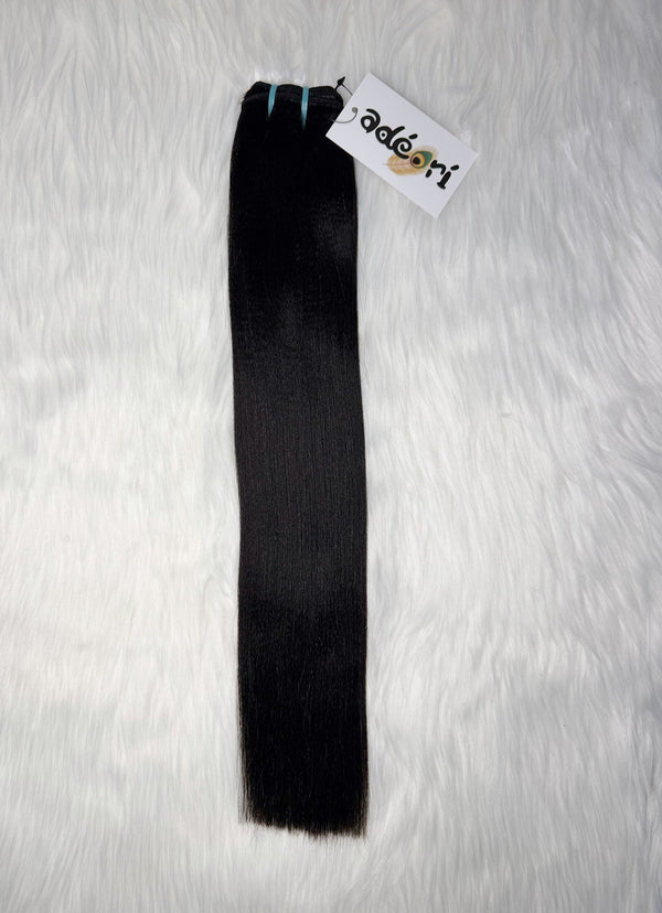 Sányán - Natural Straight weft, fanned to show the sleek fall