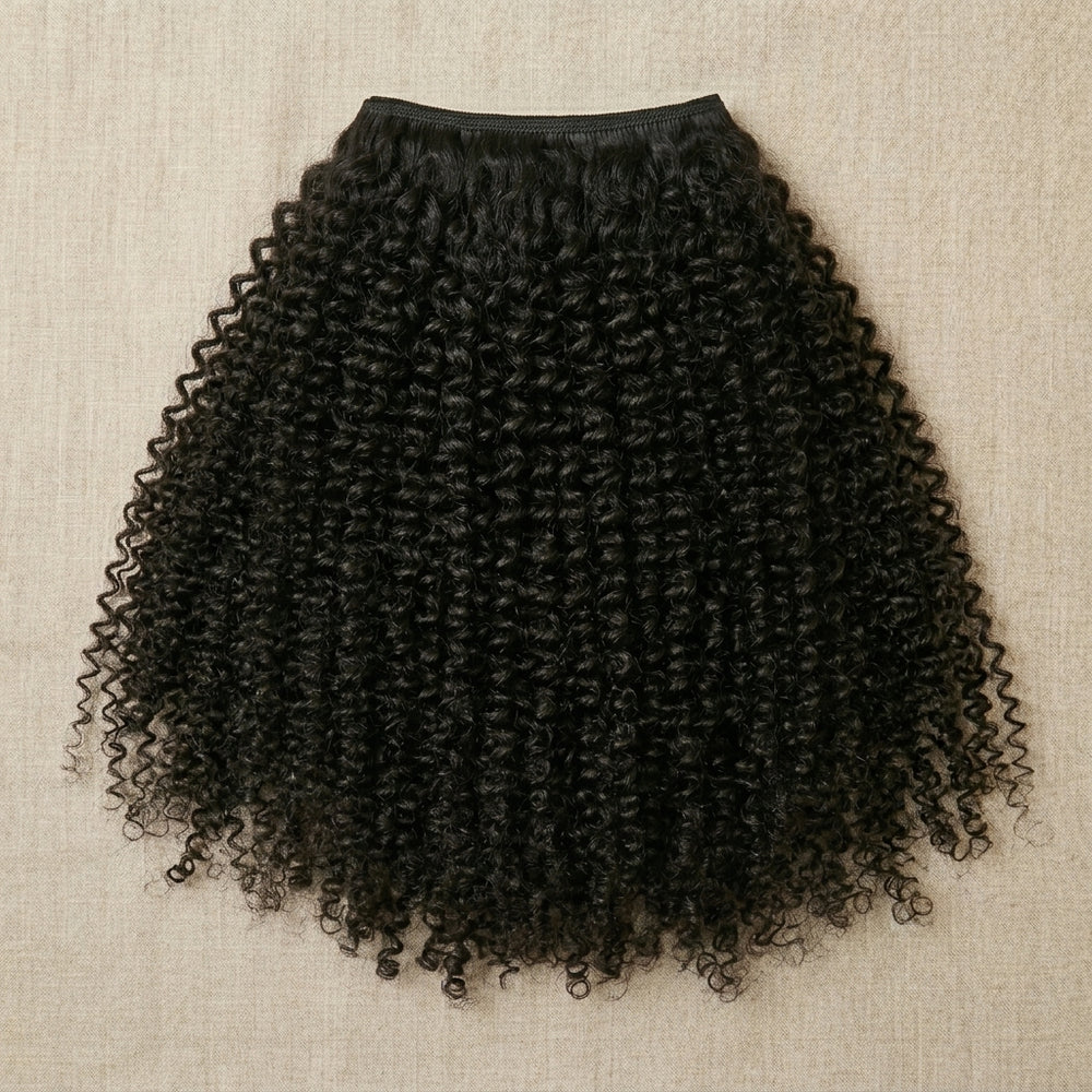 Adéorí 4C Kinky virgin hair bundles — 100% human hair flat lay