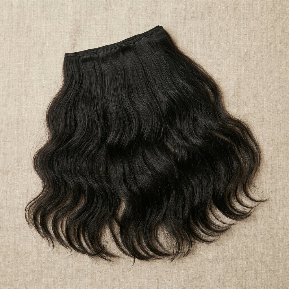 Adéorí Loose Wave virgin hair bundles — 100% human hair flat lay
