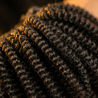 Close-up of Adéorí 4C Kinky virgin hair curl pattern and strand quality