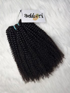 Ayaba - Afro Kinky, 4B weft, folded to show density