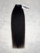 Dídán - Kinky Straight Blowout weft, fanned to show the sleek blowout