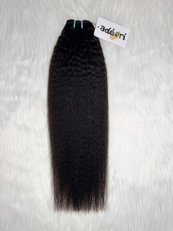Dídán - Kinky Straight Blowout weft, fanned to show the sleek blowout