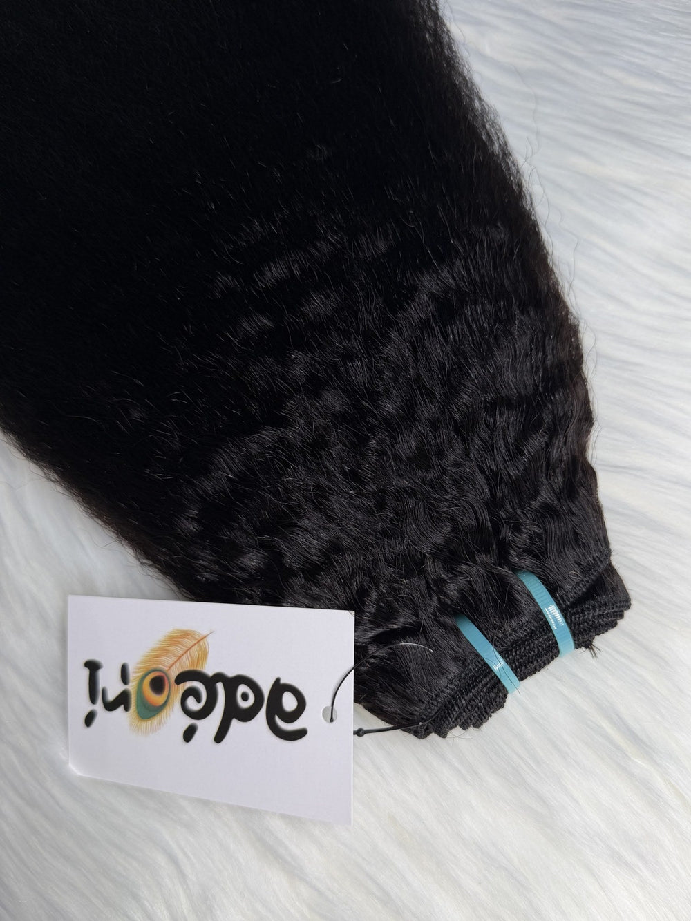Dídán - Kinky Straight Blowout weft, folded to show body