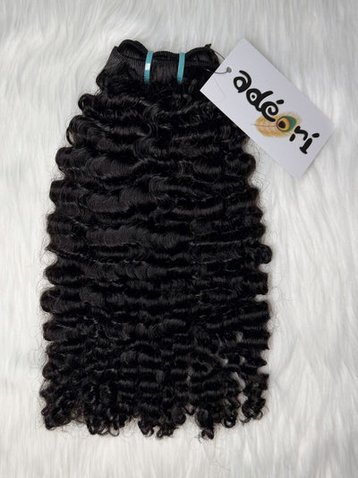 Ìlẹ̀kẹ̀ - Loose Kinky Curly, 3B–3C flat lay