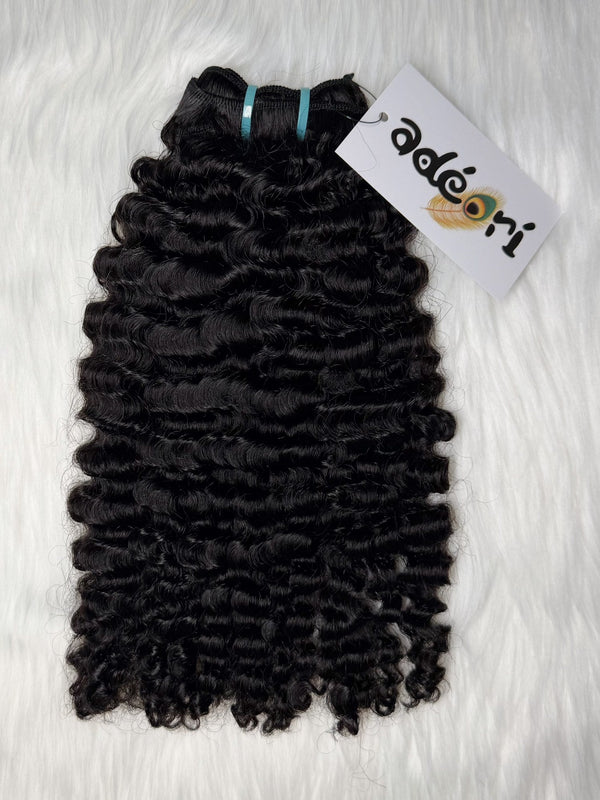 Ìlẹ̀kẹ̀ - Loose Kinky Curly weft, fanned to show the spiral ringlets