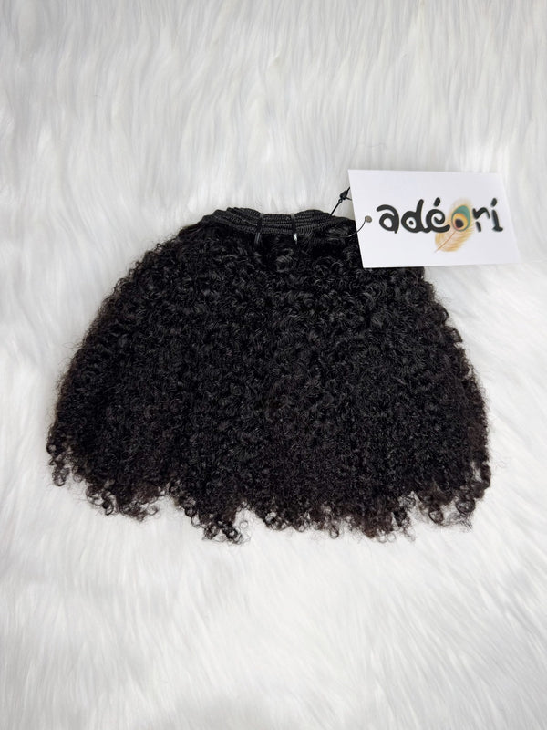 Ìyẹ́ - Afro Curly, 4B–4C weft, fanned to show the tight afro-curl