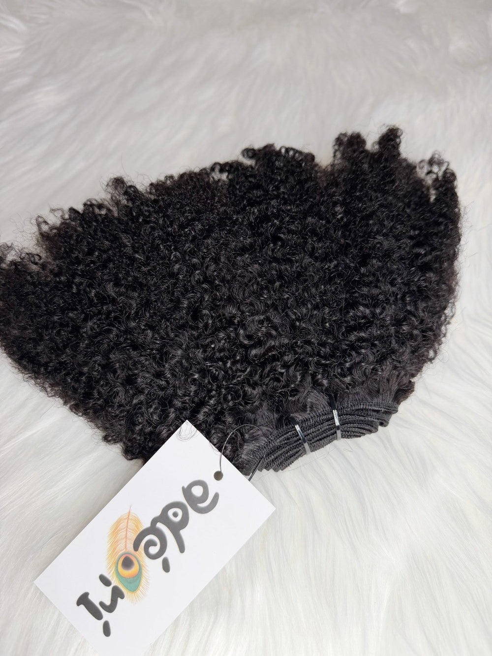 Ìyẹ́ - Afro Curly, 4B–4C weft, close detail with machine track