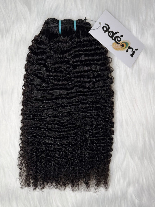 Ọ̀yàyà - Tight Kinky Curly, 4A weft, fanned to show the springy coil