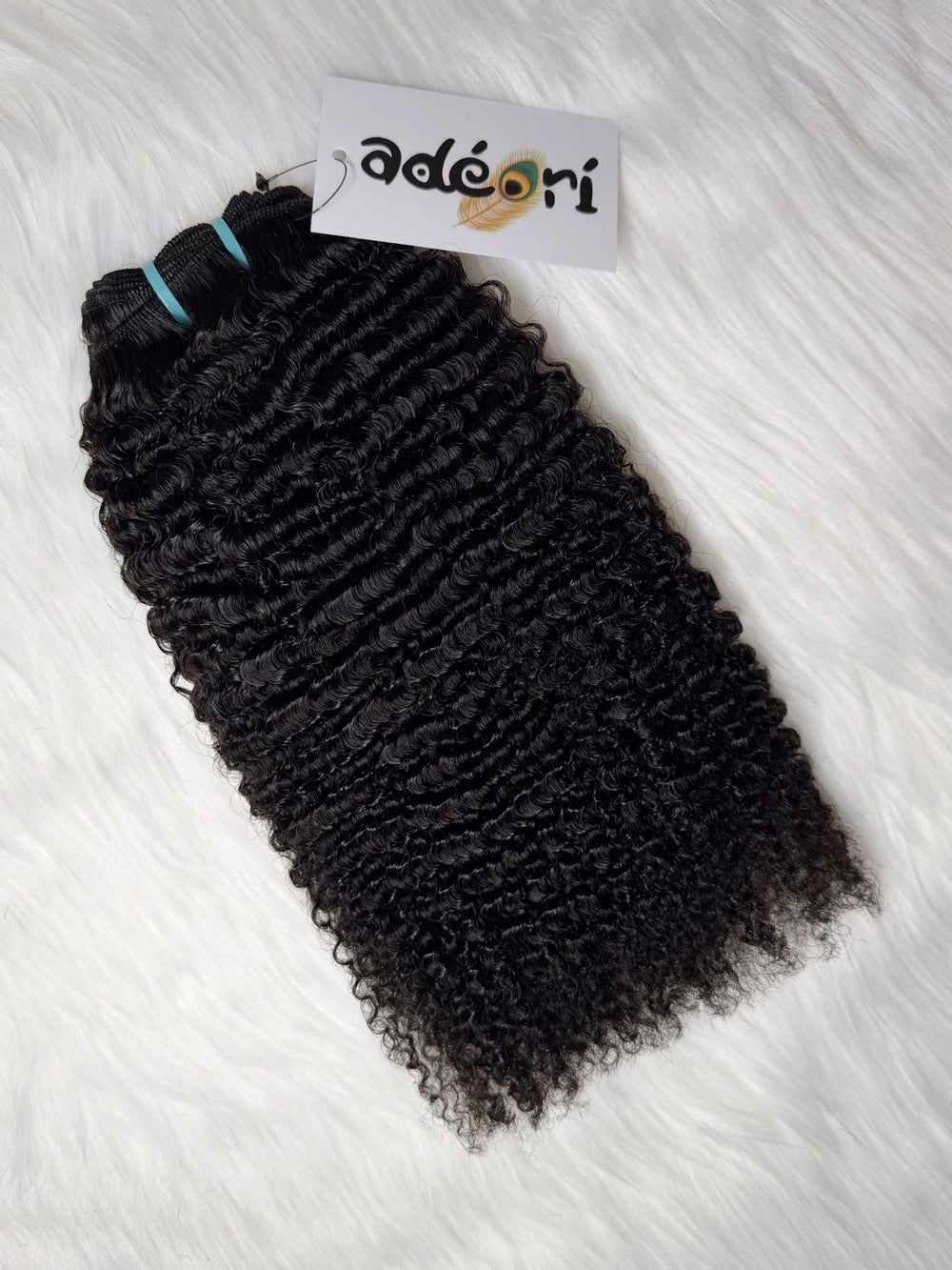 Ọ̀yàyà - Tight Kinky Curly, 4A weft, folded to show density
