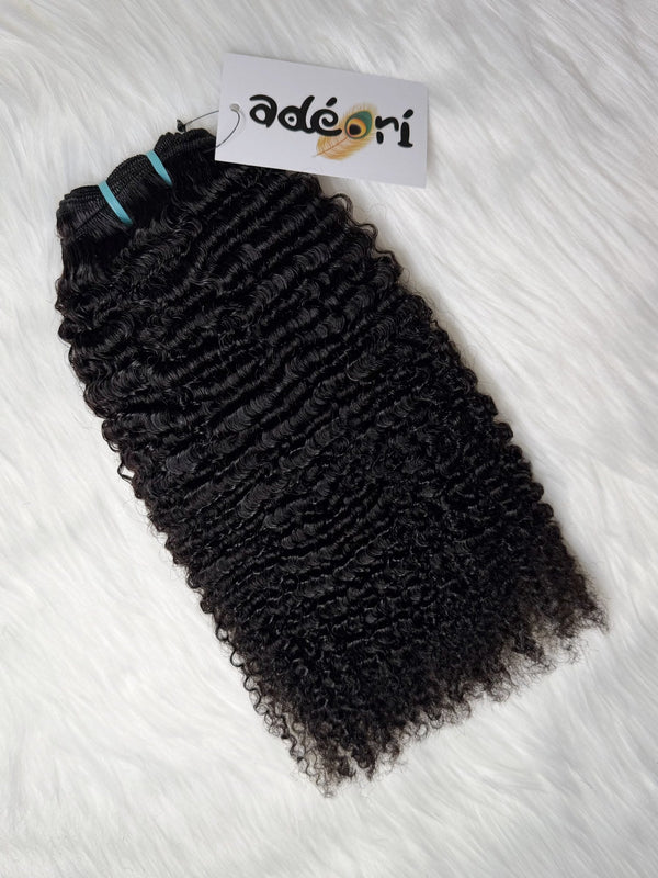 Ọ̀yàyà - Tight Kinky Curly, 4A weft, folded to show density