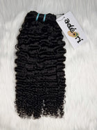 Wúrà - Kinky Curly, 3C–4A weft, fanned to show the full-bodied S-pattern