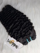 Wúrà - Kinky Curly, 3C–4A weft, close detail with machine track