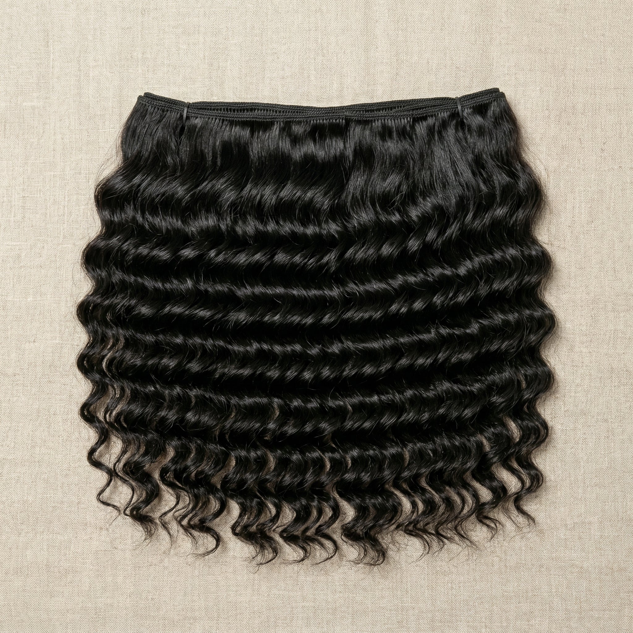 Deep wave hair extensions flat lay